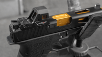 VPDOT D300X red dot sight mounted on carry pistol after training session, on range bag